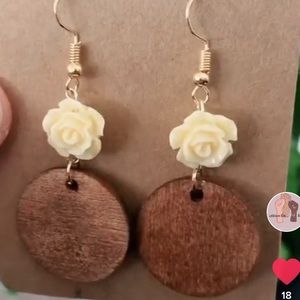 Wood and acrylic rose round earrings.